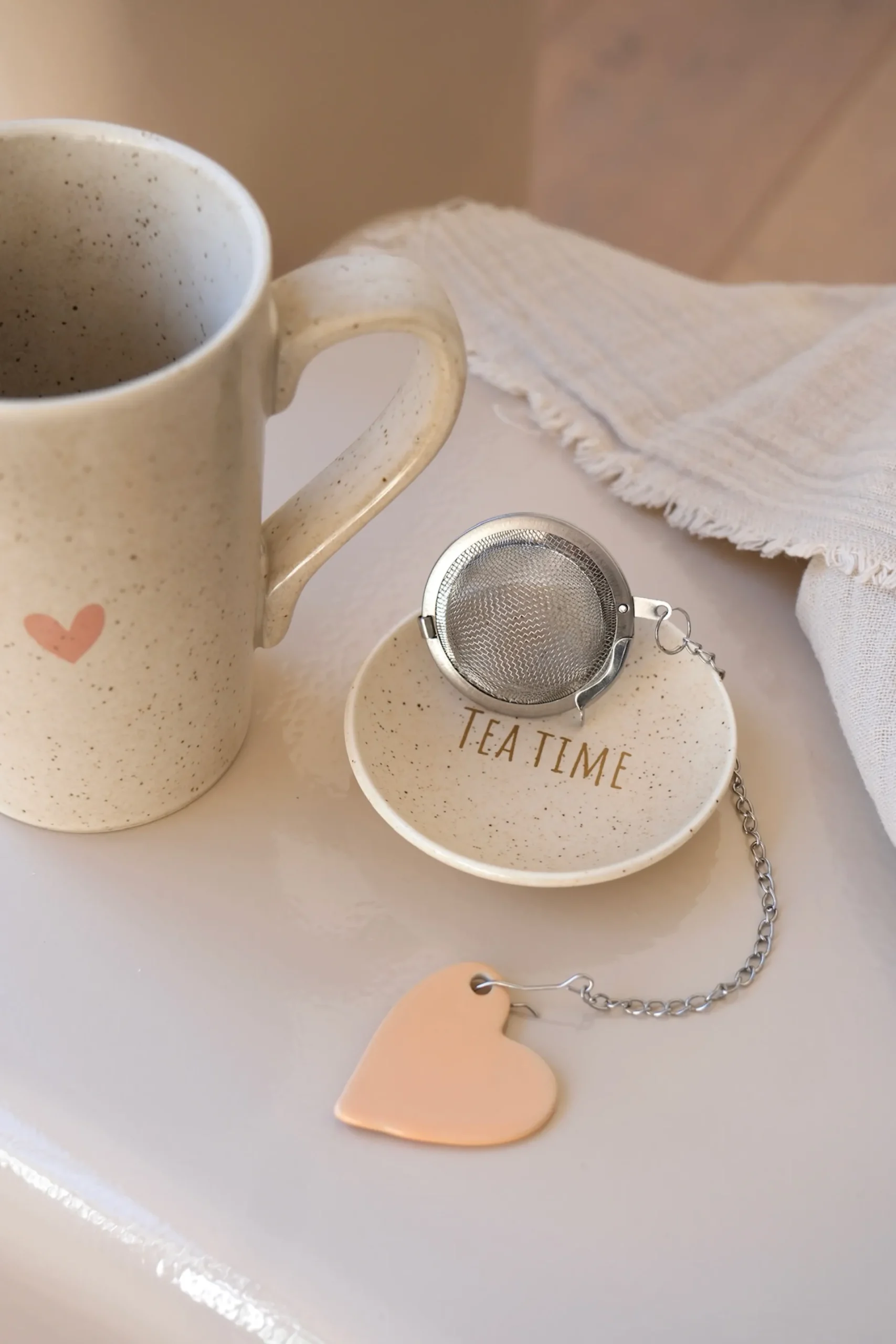 Sélection M Tasse à thé en porcelaine avec soucoupe et boule à thé Discount